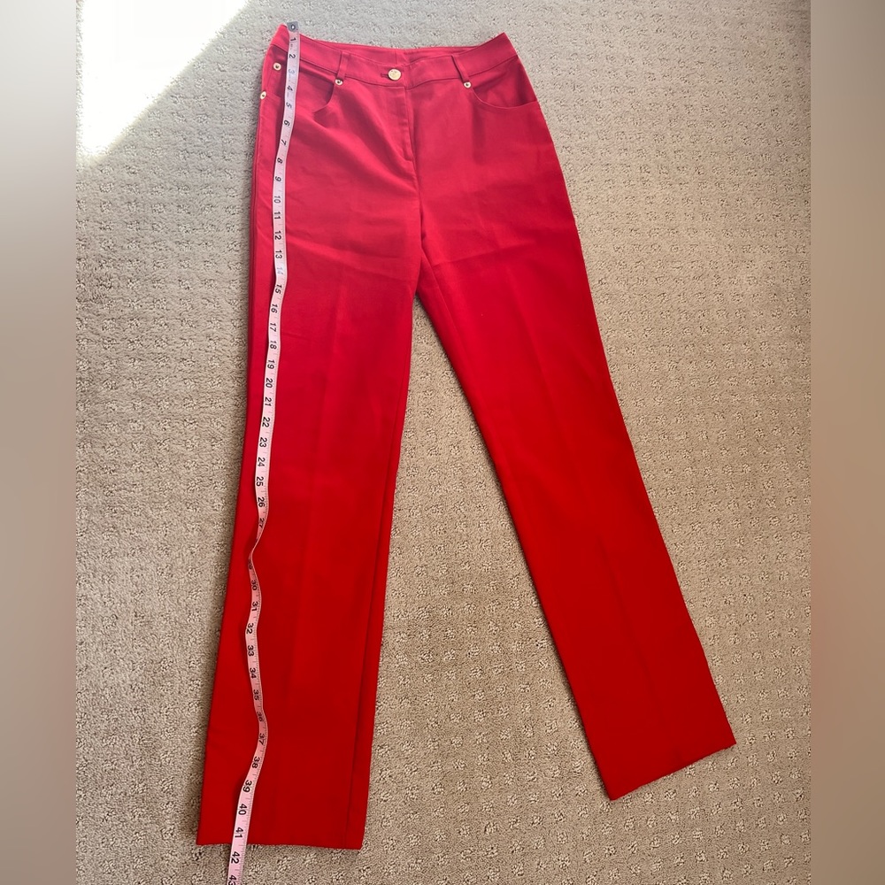 St. John red pants beautiful soft fabric. Some stretch. Never worn.